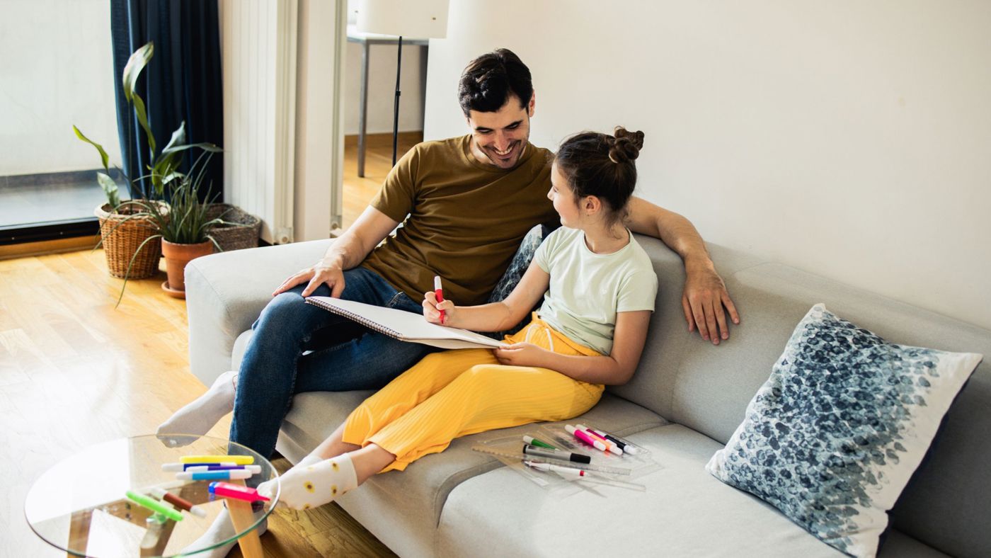 a couple enjoying Karndean vinyl flooring in a social house