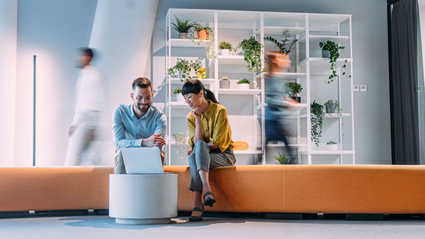 two people enjoying Karndean floor in a workplace