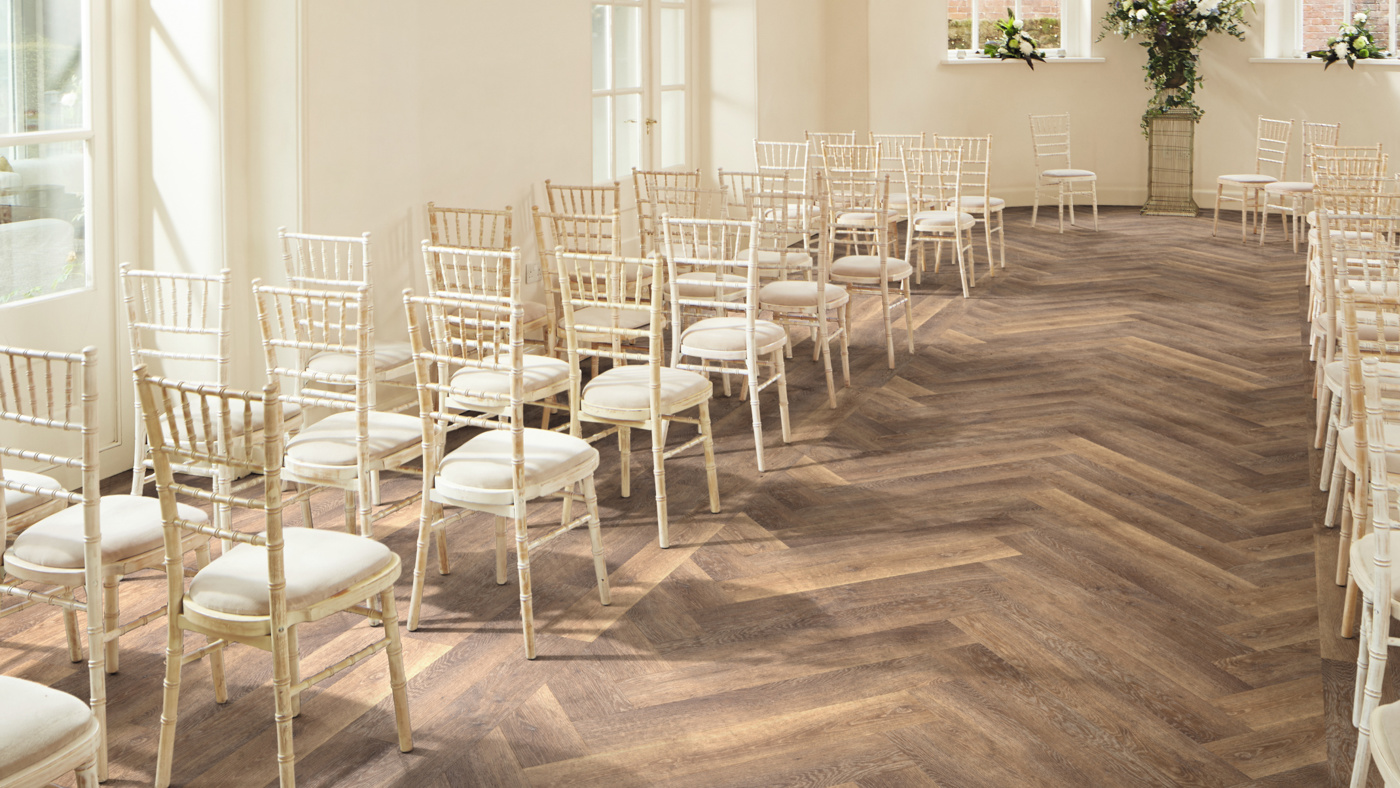 Wedding venue with Mid Limed Oak KP96 floors in a herringbone pattern to mark an aisle