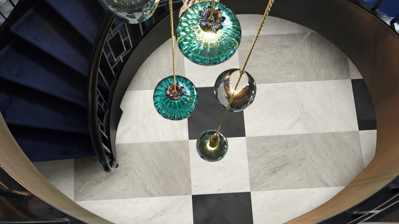 Ionic Marble LM30, Corinthian Marble LM31 and Doric Marble LM32 floors at the bottom of a spiral staircase