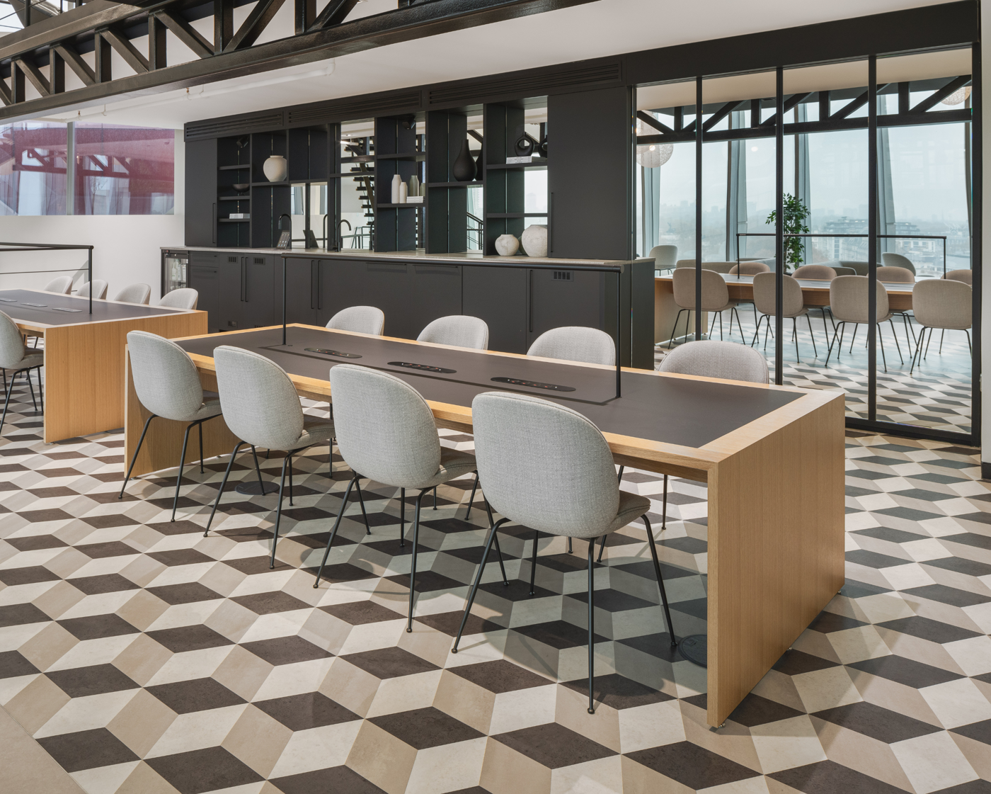 Karndean Commercial stone LVT flooring from the Kaleidoscope collection in Cubix pattern laid in an office