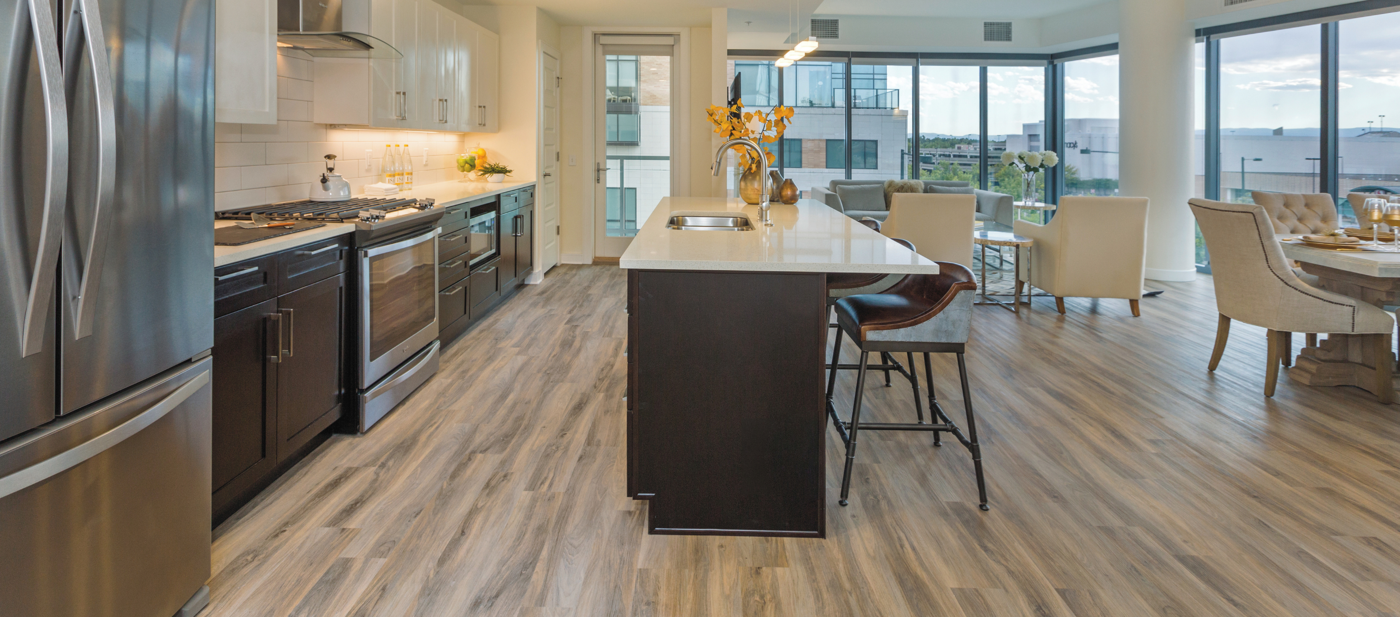 Weathered Elm WP311 floors in a luxury apartment open plan kitchen