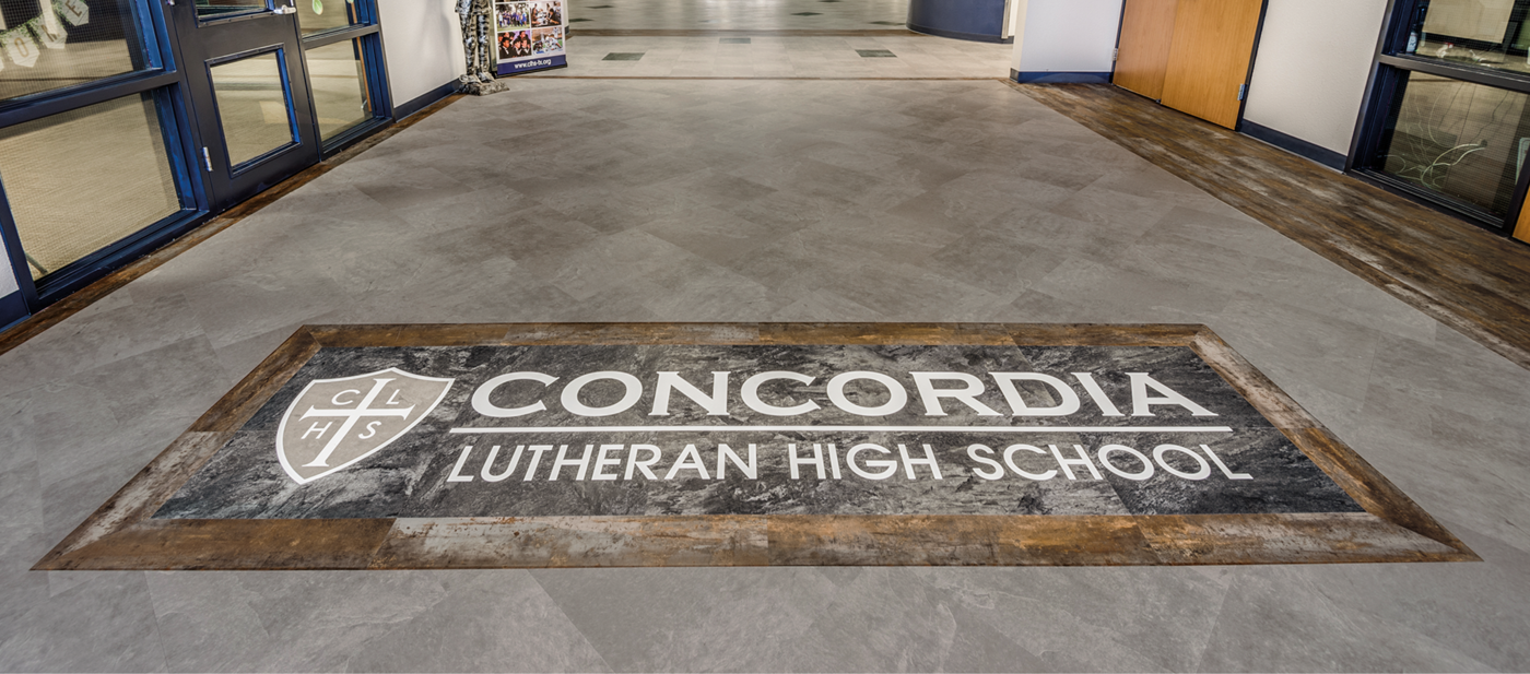 Concordia Lutheran High School logo in Canberra LM06, Texo SP718 and White V10 on the Corris LM22 floors