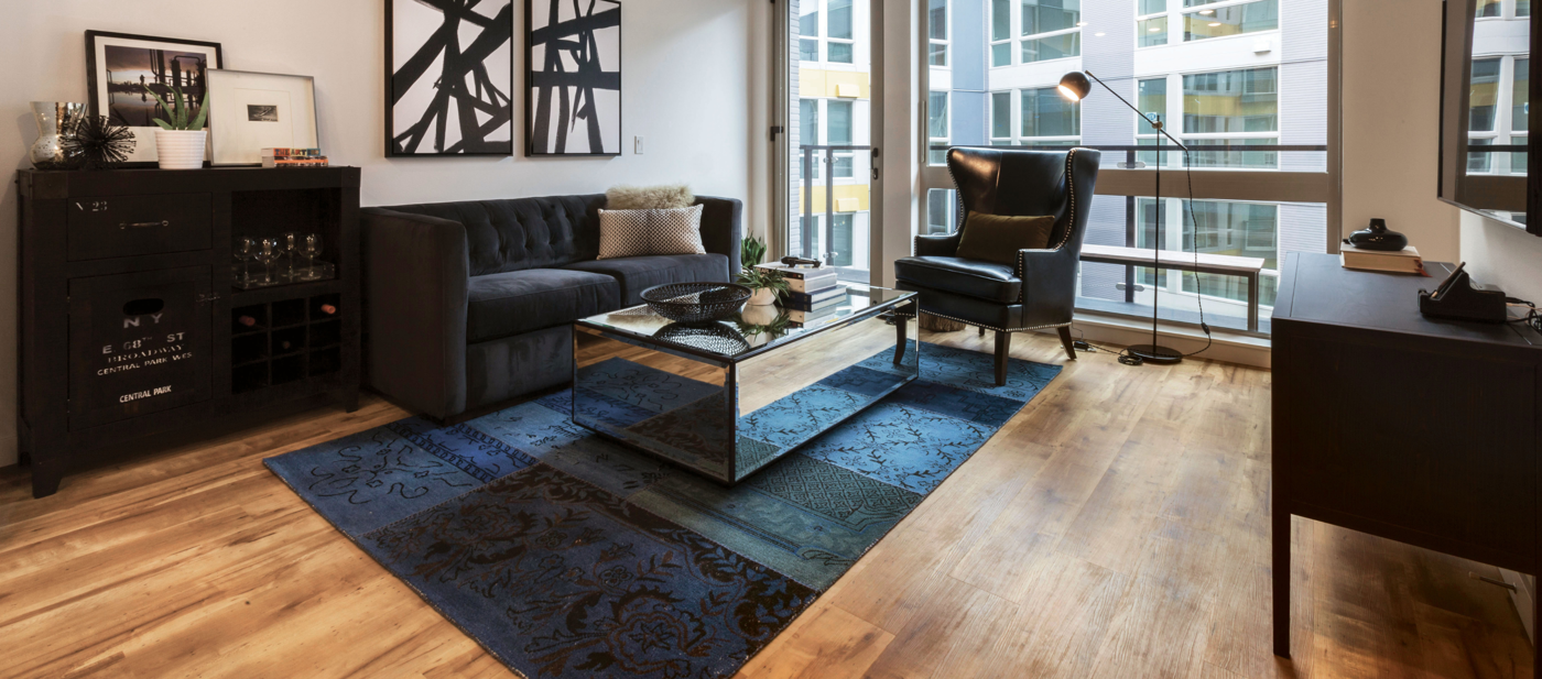 Apartment living area with Reclaimed Maple floors